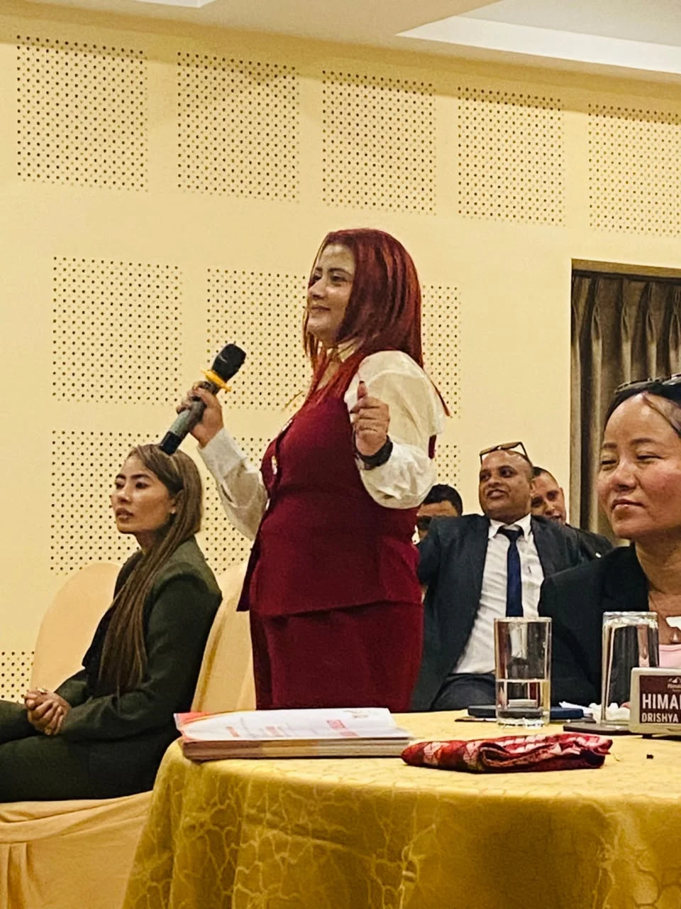 Sandhya Baral speaking with participants during a learning session